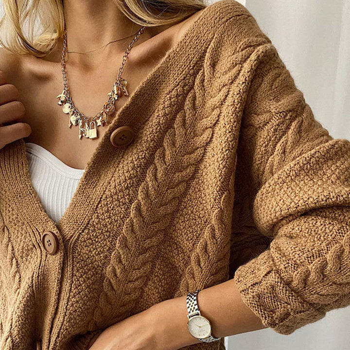 Kvinnors chunky stickad cardigan med knapp och lös passform Mirla-Eva Jonsson