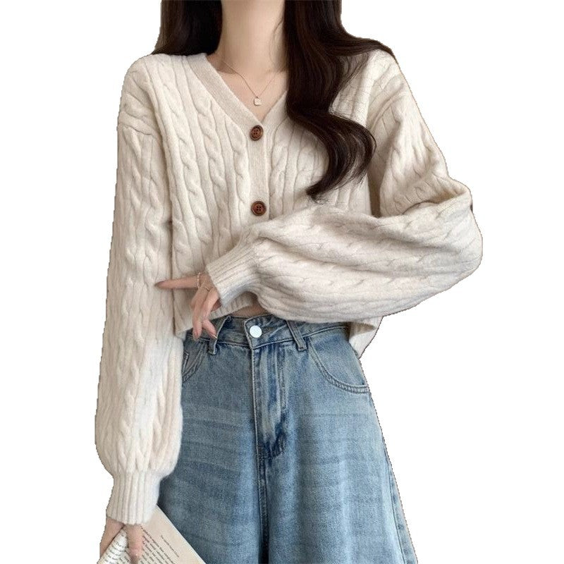 Kvinnors chunky stickad cardigan med knapppdetaljer och djup V-hals Mirla-Eva Jonsson