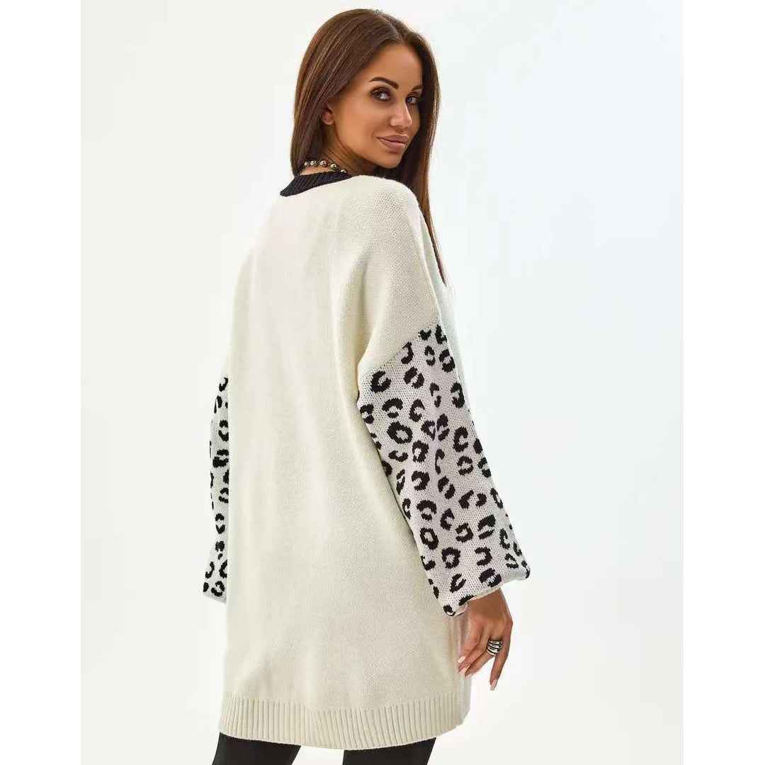 Kvinnors chunky stickad cardigan med kontrasterande ärmar och knapputformning Mirla-Eva Jonsson