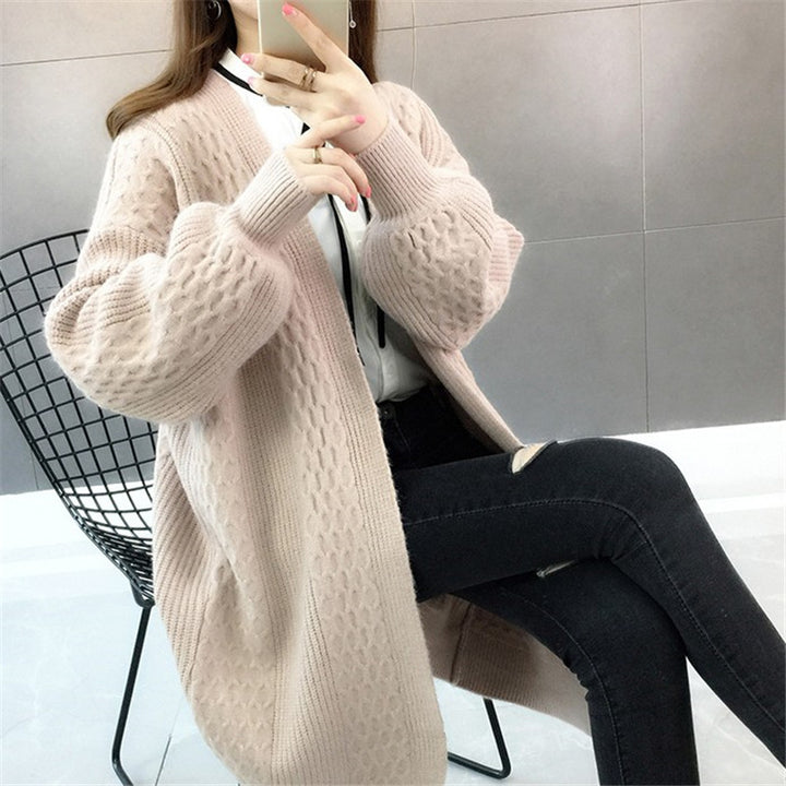 Kvinnors chunky stickad cardigan med öppen skärning och djup V-hals Mirla-Eva Jonsson