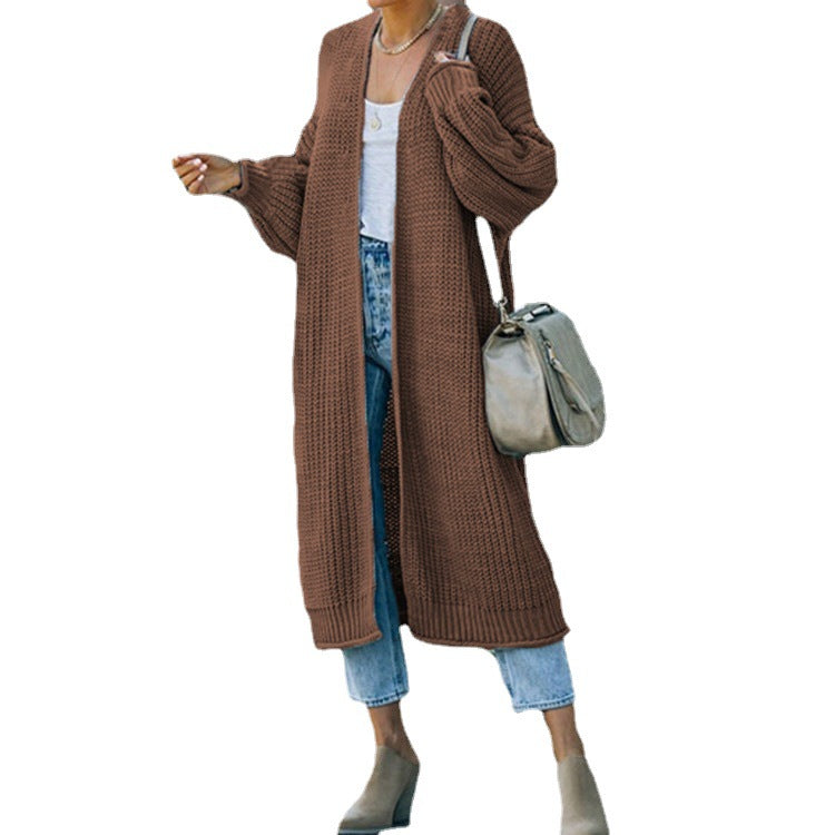 Kvinnors chunky stickad cardigan med öppna stygn och avslappnad passform Mirla-Eva Jonsson