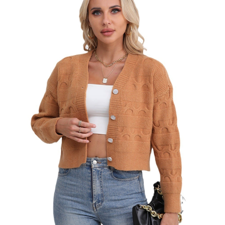 Kvinnors chunky stickad cardigan med unikt mönster och bekväm passform Mirla-Eva Jonsson