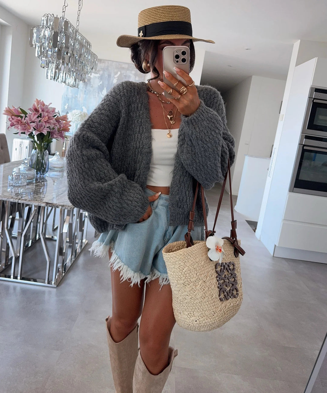 Kvinnors chunky stickad cardigan med voluminösa ärmar och öppen front Mirla-Eva Jonsson