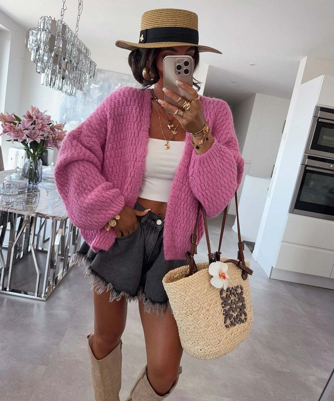 Kvinnors chunky stickad cardigan med voluminösa ärmar och öppen front Mirla-Eva Jonsson