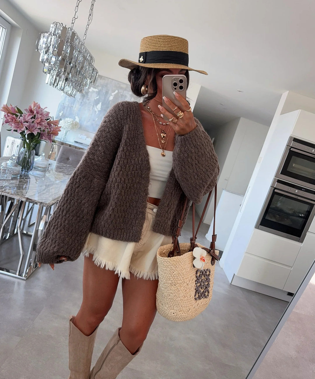 Kvinnors chunky stickad cardigan med voluminösa ärmar och öppen front Mirla-Eva Jonsson