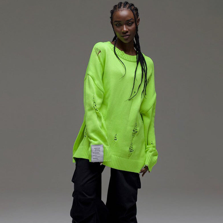 Kvinnors chunky stickad oversized tröja med slitna detaljer Mirla-Eva Jonsson