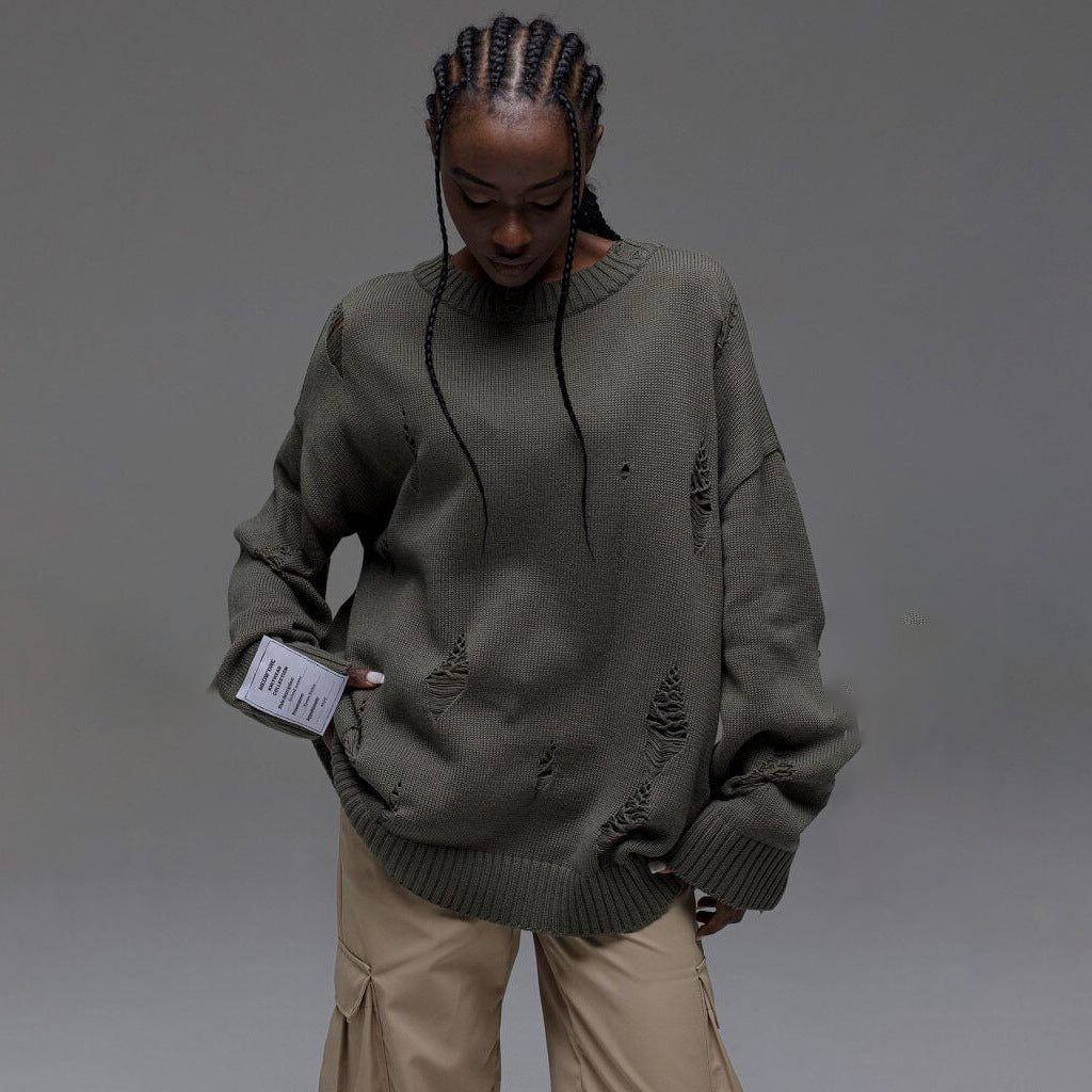 Kvinnors chunky stickad oversized tröja med slitna detaljer Mirla-Eva Jonsson