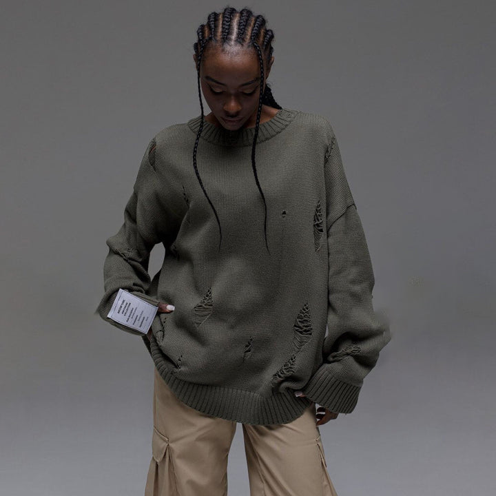 Kvinnors chunky stickad oversized tröja med slitna detaljer Mirla-Eva Jonsson
