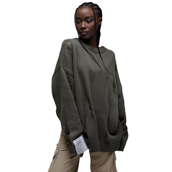 Kvinnors chunky stickad oversized tröja med slitna detaljer Mirla-Eva Jonsson
