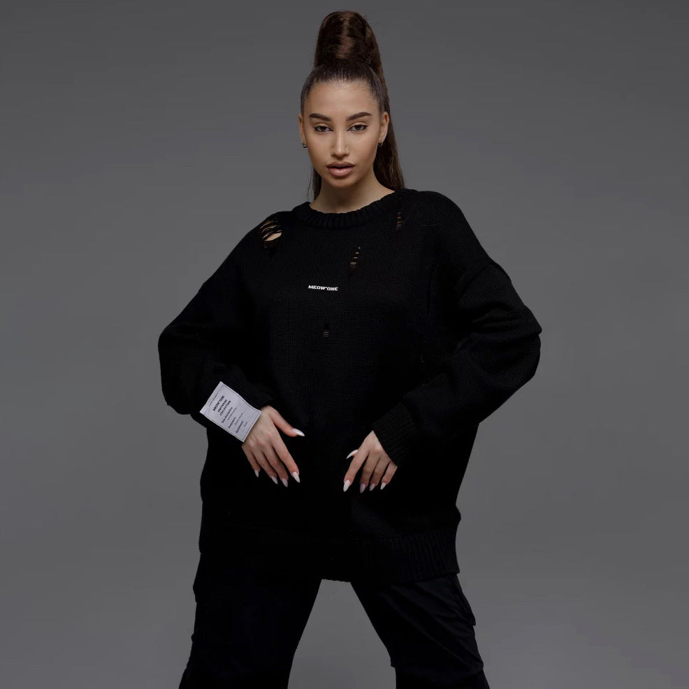 Kvinnors chunky stickad oversized tröja med slitna detaljer Mirla-Eva Jonsson