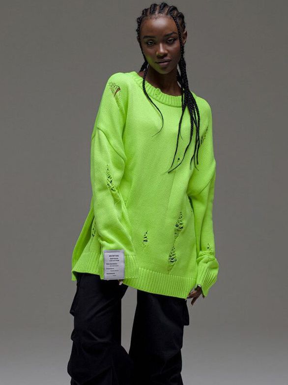 Kvinnors chunky stickad oversized tröja med slitna detaljer Mirla-Eva Jonsson