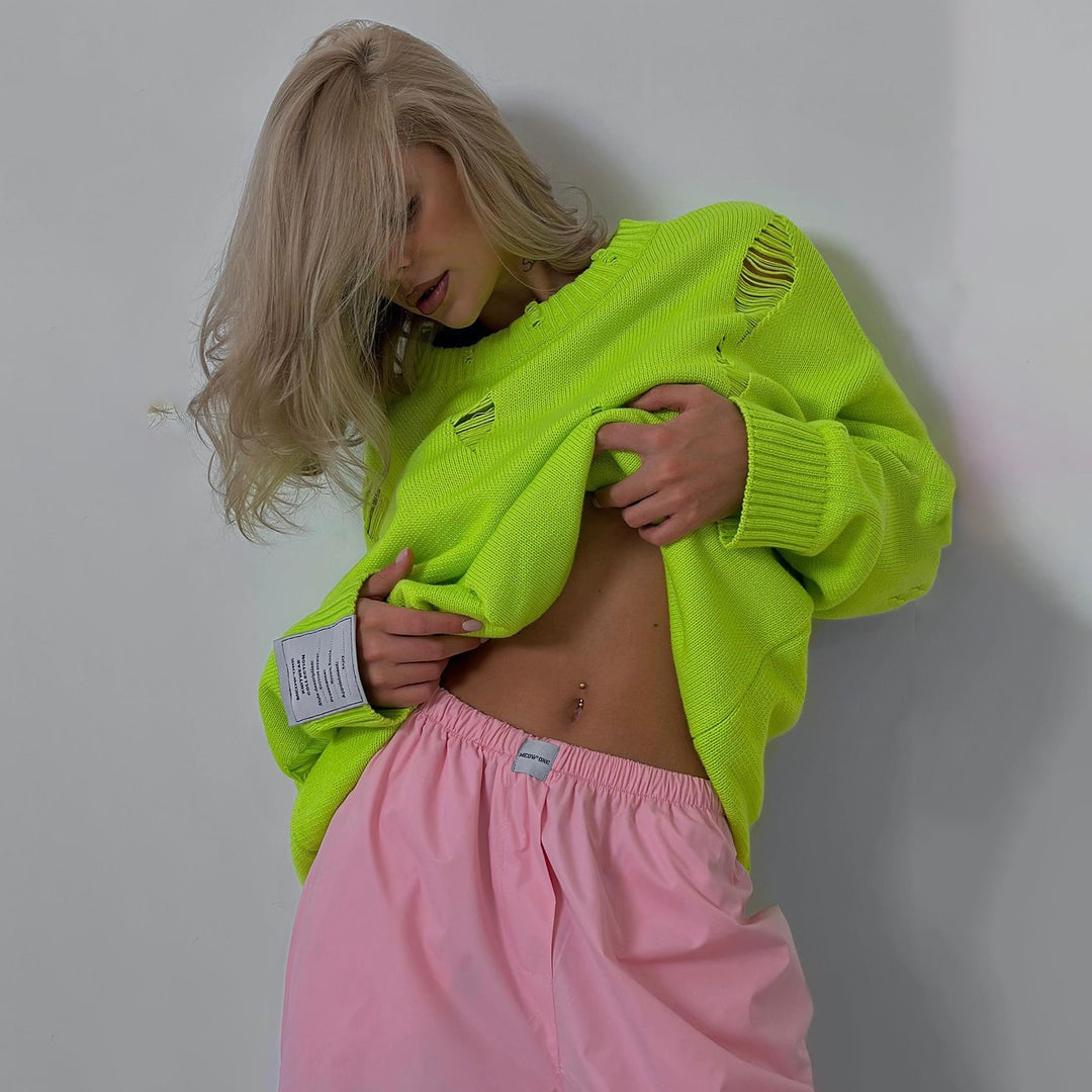 Kvinnors chunky stickad oversized tröja med slitna detaljer Mirla-Eva Jonsson