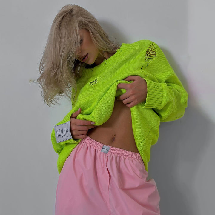 Kvinnors chunky stickad oversized tröja med slitna detaljer Mirla-Eva Jonsson