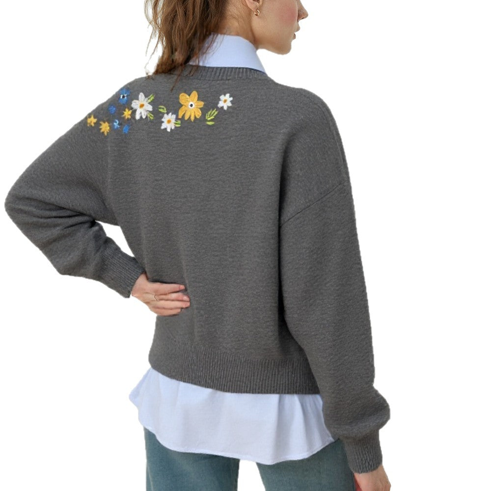 Kvinnors chunky stickad tröja med blommig detaljer bak och lös passform Mirla-Eva Jonsson