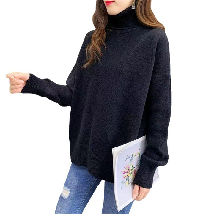 Kvinnors chunky stickad tröja med hög krage och oversized passform Mirla-Eva Jonsson