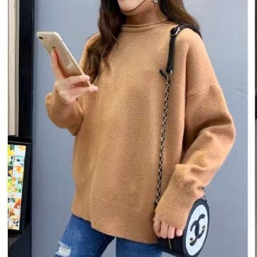 Kvinnors chunky stickad tröja med hög krage och oversized passform Mirla-Eva Jonsson