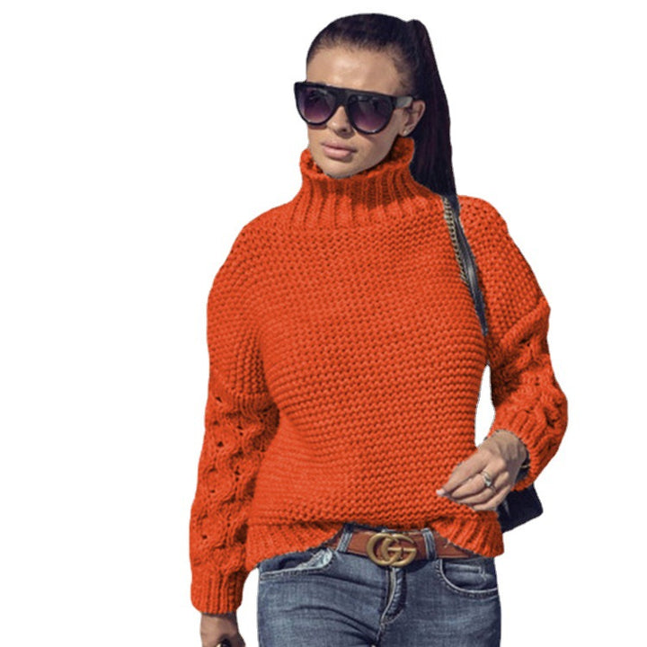 Kvinnors chunky stickad tröja med hög krage och strukturerad sömsyn Mirla-Eva Jonsson