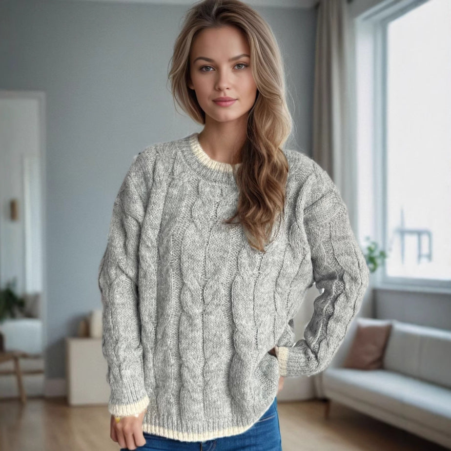 Kvinnors chunky stickad tröja med kabeldesign och generös drapering Mirla-Eva Jonsson