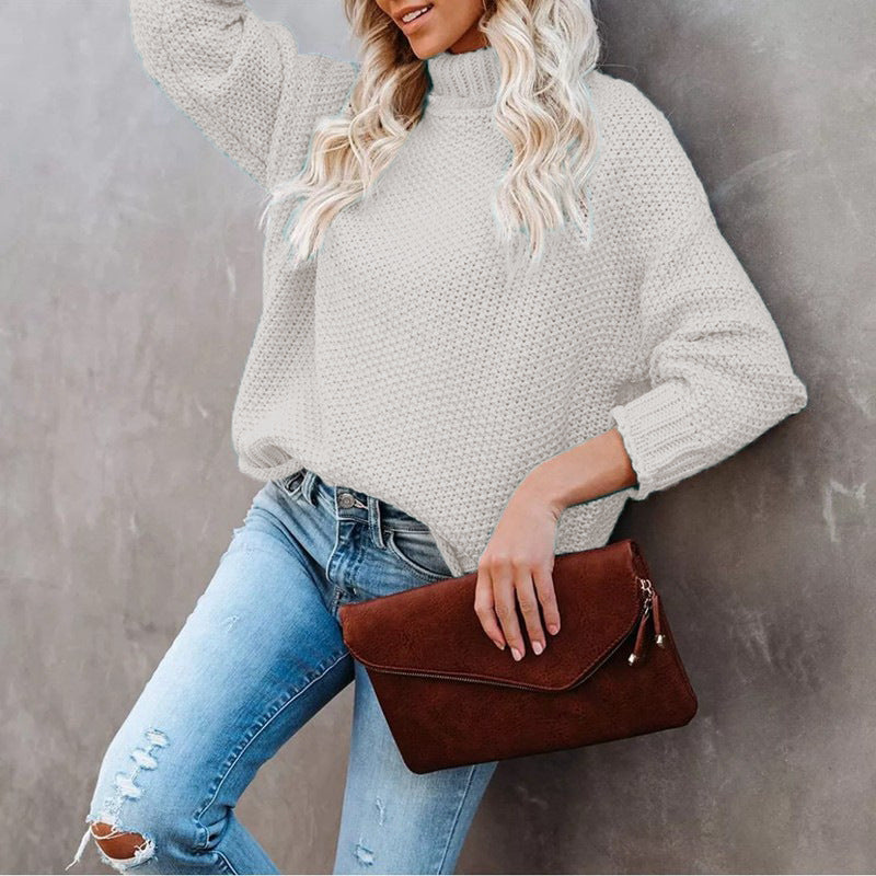 Kvinnors chunky stickad tröja med rullkrage och avslappnad passform Mirla-Eva Jonsson