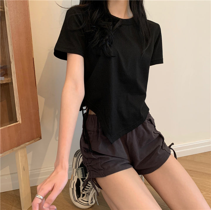 Kvinnors crop top med asymmetrisk nederkant och lös passform-Eva Jonsson