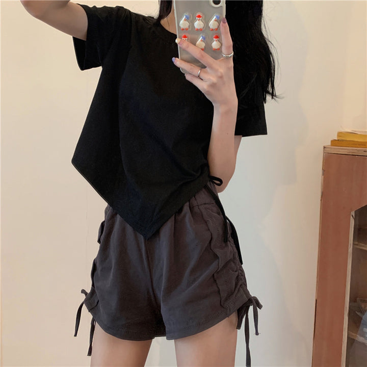 Kvinnors crop top med asymmetrisk nederkant och lös passform-Eva Jonsson