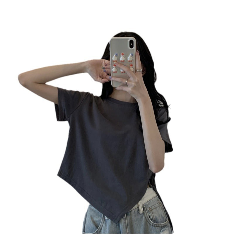 Kvinnors crop top med asymmetrisk nederkant och lös passform-Eva Jonsson