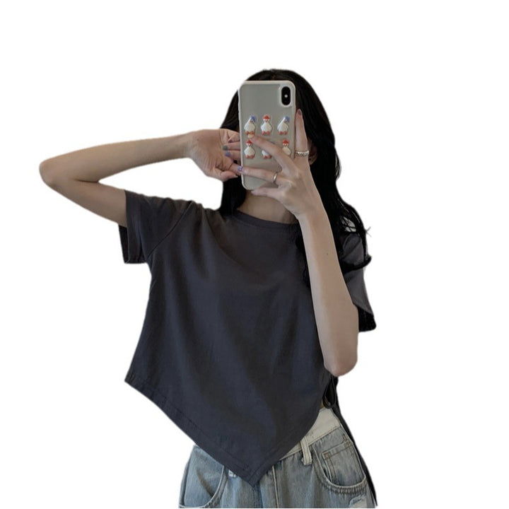 Kvinnors crop top med asymmetrisk nederkant och lös passform-Eva Jonsson