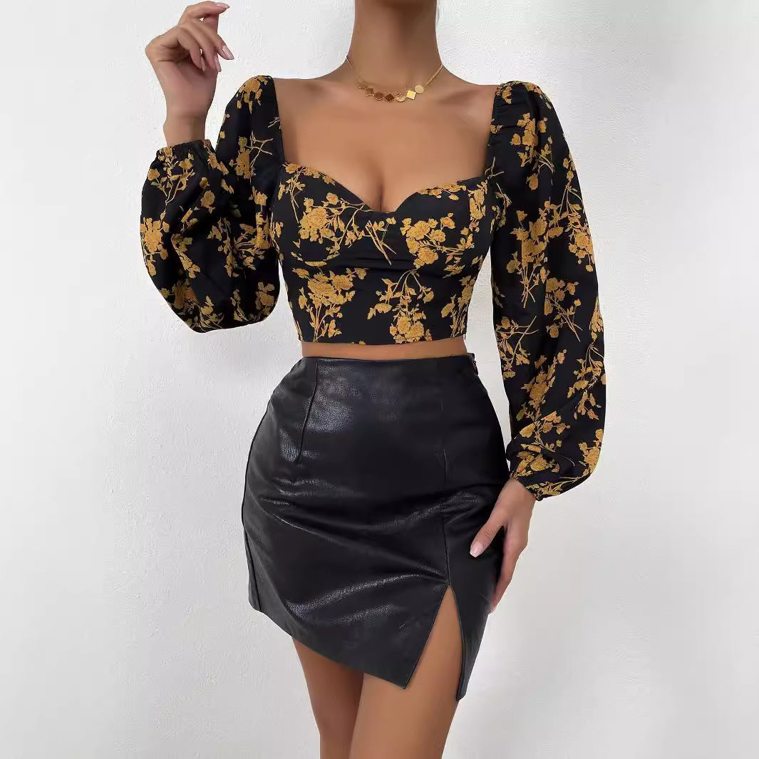 Kvinnors crop top med blommönster och eleganta puffärmar Mirla-Eva Jonsson