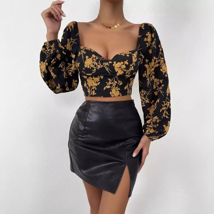 Kvinnors crop top med blommönster och eleganta puffärmar Mirla-Eva Jonsson
