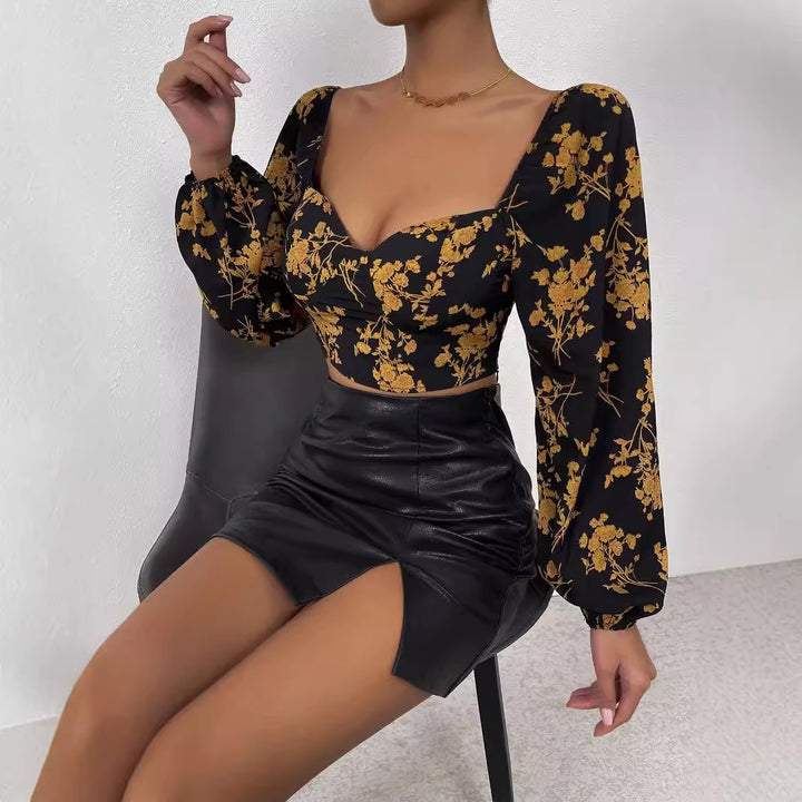 Kvinnors crop top med blommönster och eleganta puffärmar Mirla-Eva Jonsson