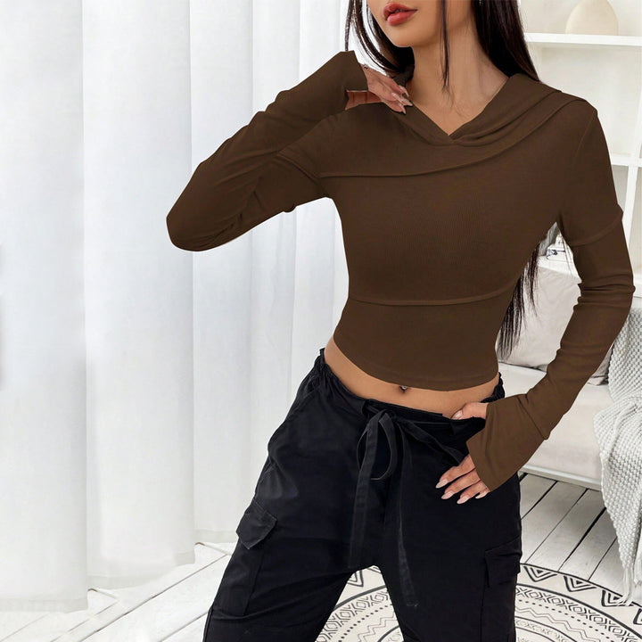 Kvinnors crop top med elegant huva design och långa ärmar Mirla-Eva Jonsson