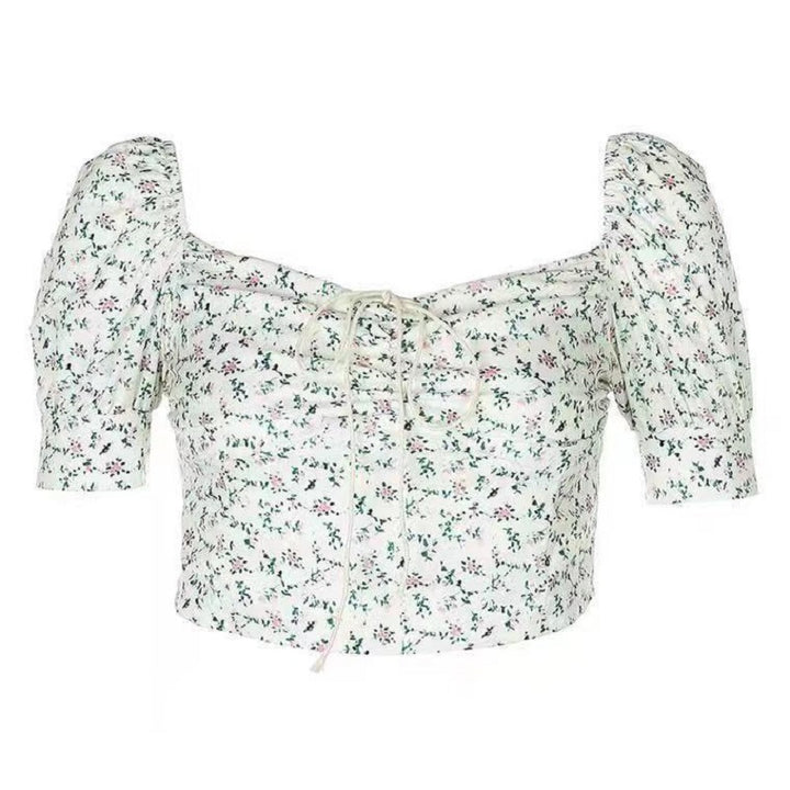 Kvinnors crop top med puffärmar och blommönster-Eva Jonsson