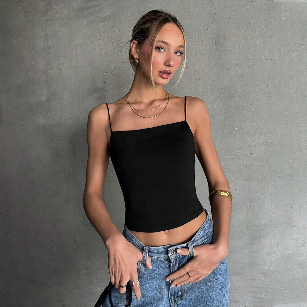 Kvinnors crop top med smala spaghetti remmar och en tajt passform Mirla-Eva Jonsson