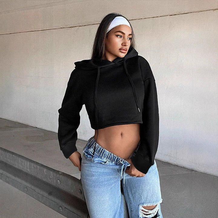 Kvinnors cropped sweatshirt med lös passform och huva Mirla-Eva Jonsson