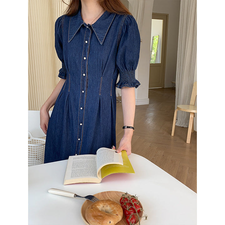 Kvinnors denim midi klänning med voluminösa ärmar och knappdetaljer Mirla-Eva Jonsson