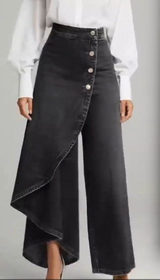 Kvinnors denimkjol med asymmetrisk skärning och knappdetaljer Mirla-Eva Jonsson