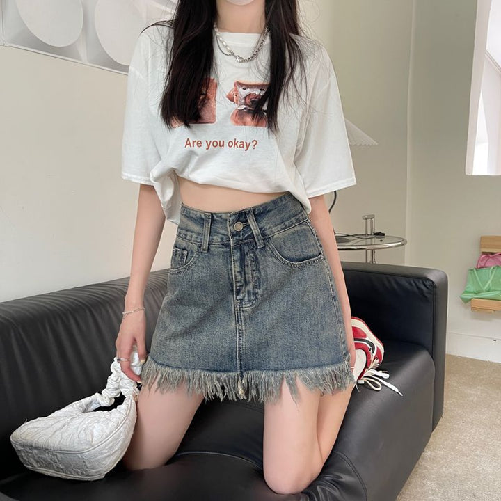Kvinnors denimshorts med fransad nederkant och hög midja-Eva Jonsson