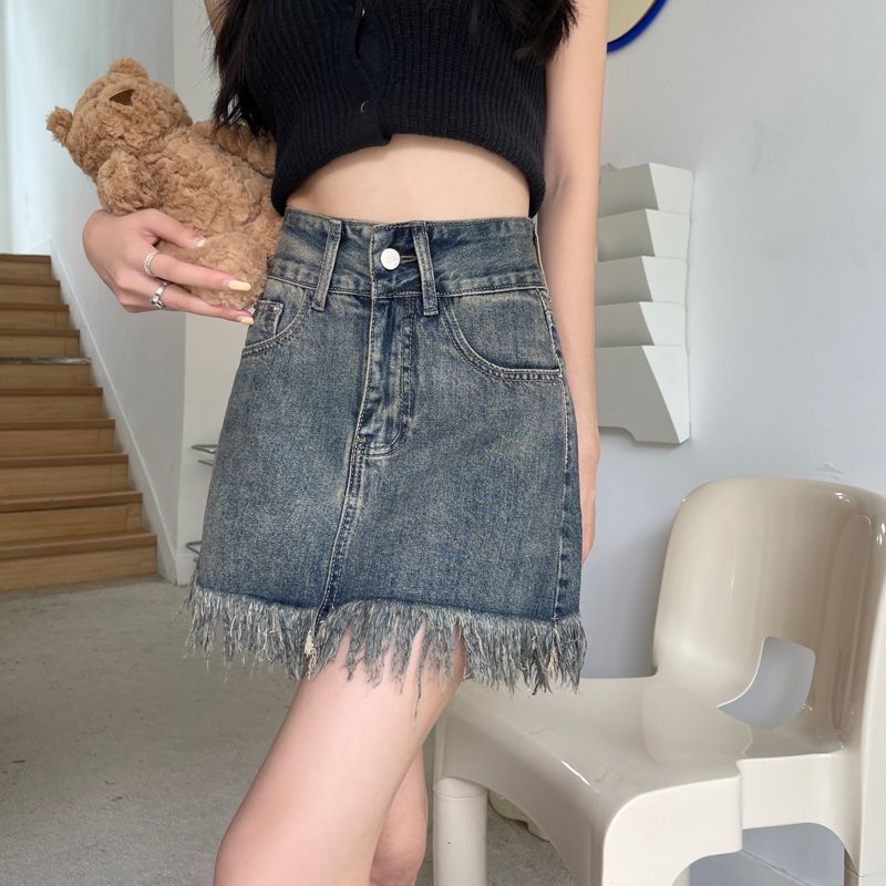 Kvinnors denimshorts med fransad nederkant och hög midja-Eva Jonsson