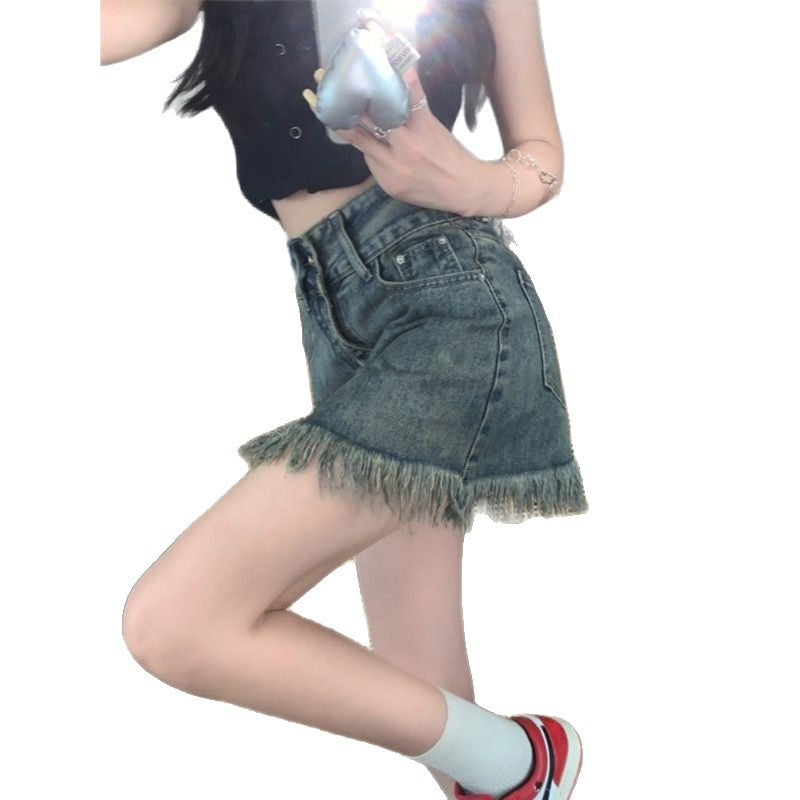 Kvinnors denimshorts med fransad nederkant och hög midja-Eva Jonsson