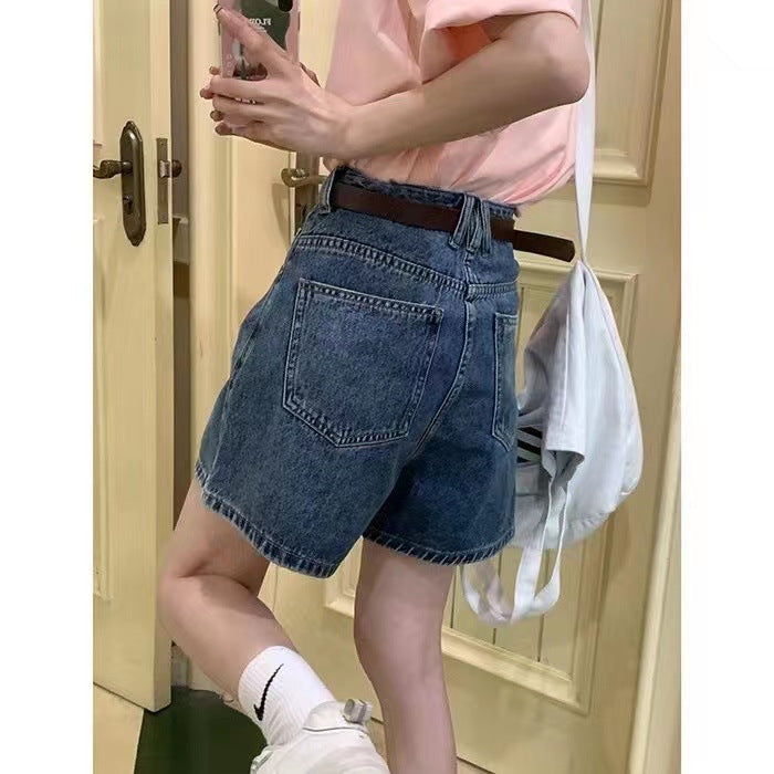 Kvinnors denimshorts med höga fickor och lös passform-Eva Jonsson