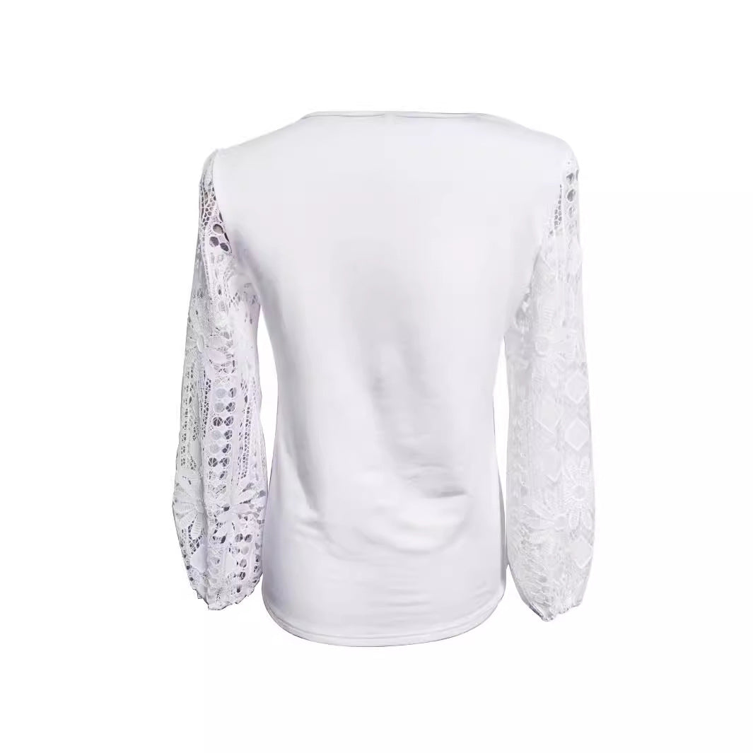 Kvinnors designerblus med spetsinsatser och elegant skärning Mirla-Eva Jonsson