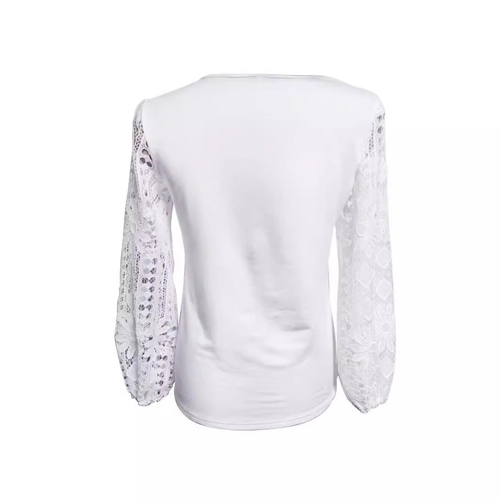 Kvinnors designerblus med spetsinsatser och elegant skärning Mirla-Eva Jonsson