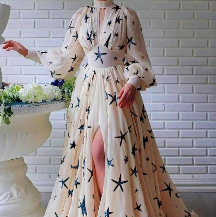 Kvinnors elegant aftondress med praktfull genomskinlighet och glittrande paljetter-Eva Jonsson
