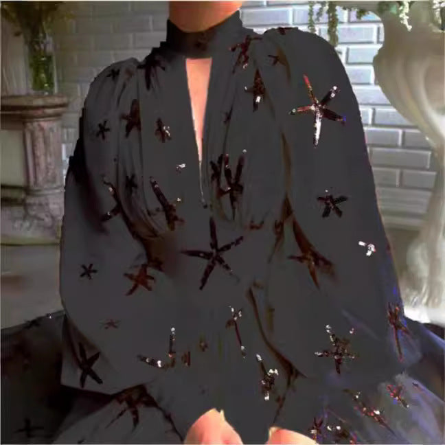 Kvinnors elegant aftondress med praktfull genomskinlighet och glittrande paljetter-Eva Jonsson
