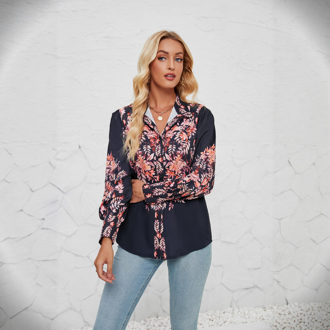 Kvinnors elegant blus med blommönster och voluminösa ärmar-Eva Jonsson