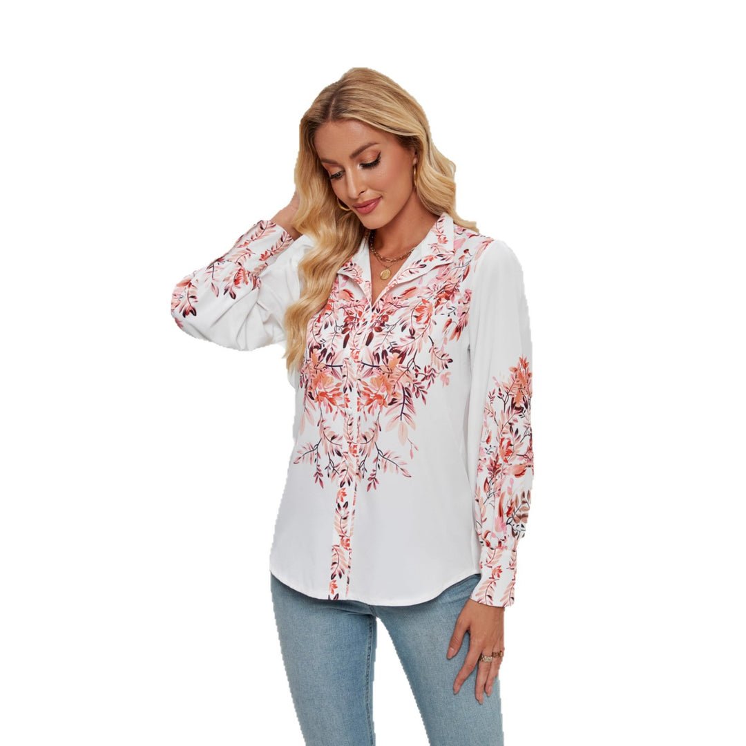Kvinnors elegant blus med blommönster och voluminösa ärmar-Eva Jonsson