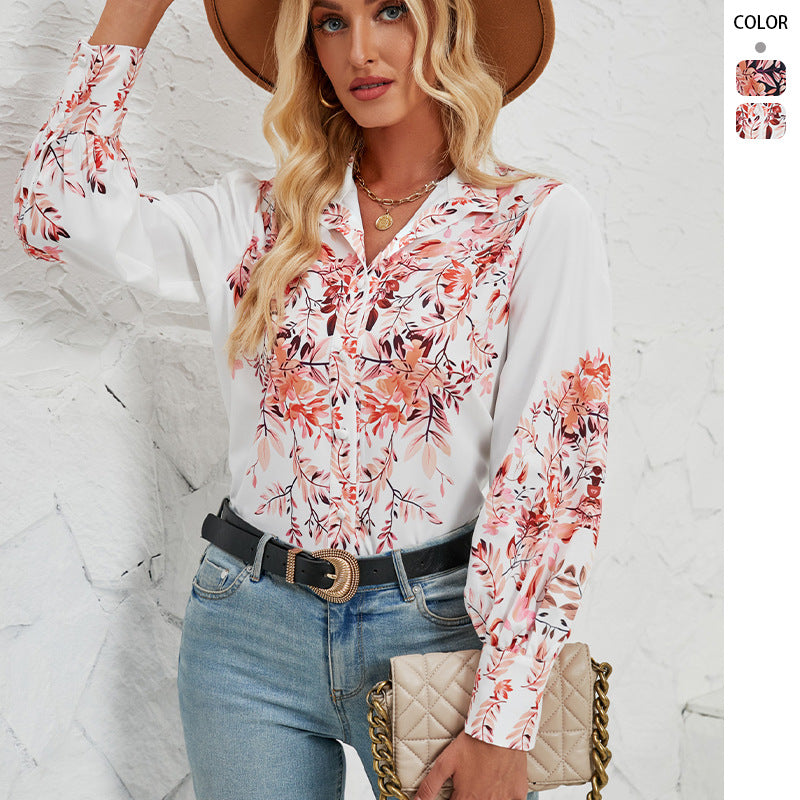 Kvinnors elegant blus med blommönster och voluminösa ärmar-Eva Jonsson