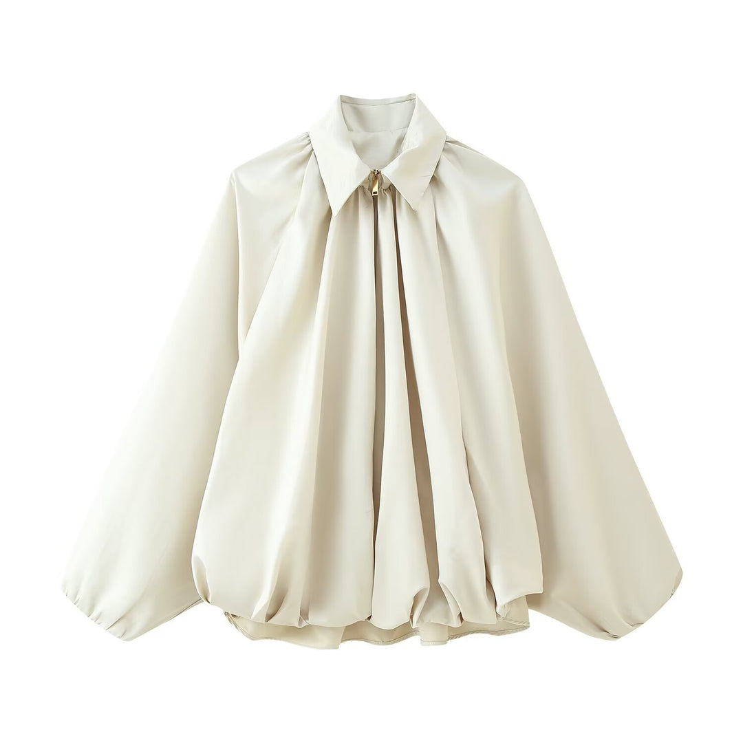 Kvinnors elegant blus med moderna veck och voluminösa ärmar Mirla-Eva Jonsson