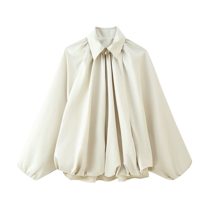Kvinnors elegant blus med moderna veck och voluminösa ärmar Mirla-Eva Jonsson