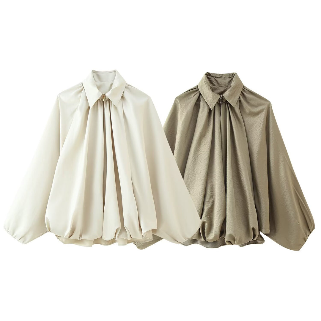 Kvinnors elegant blus med moderna veck och voluminösa ärmar Mirla-Eva Jonsson